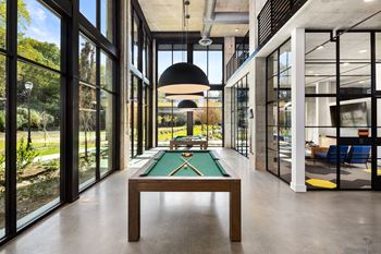 Billiards room with dry bar, lounge, & flat-screen tvs